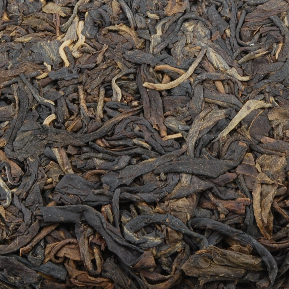 Pu-Erh Tea Cake, Yuenhai Yiwu Mountain Wild Arbor Tea , Year 2003 (Raw/Sheng)