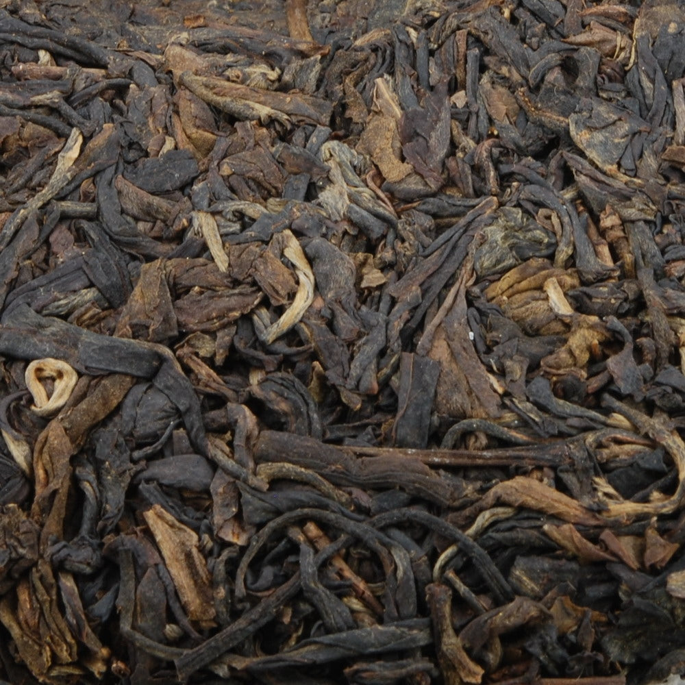 Pu-Erh Tea Cake, Yuenhai Yiwu Mountain Wild Arbor Tea , Year 2003 (Raw/Sheng)