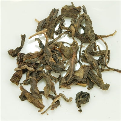 Pu-Erh Tea Cake, Wild Arbor Tree, Kunming Die Cai Qing Tea Factory, 2004 (Raw/Sheng)