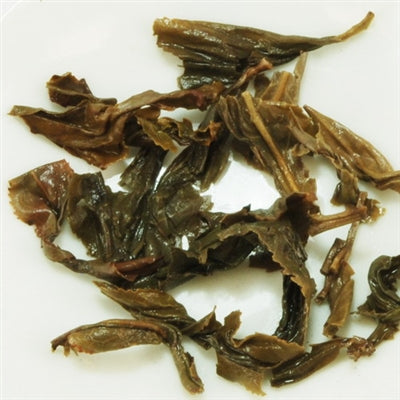 Pu-Erh Tea Cake, Wild Arbor Tree, Kunming Die Cai Qing Tea Factory, 2004 (Raw/Sheng)