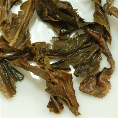 Pu-Erh Tea Cake, Wild Arbor Tree, Kunming Die Cai Qing Tea Factory, 2004 (Raw/Sheng)